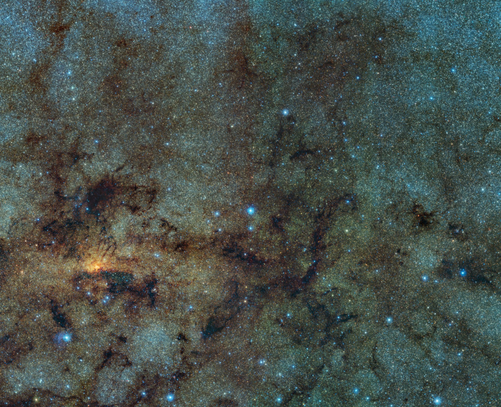 This image, captured with the VISTA infrared survey telescope, as part of the Variables in the Via Lactea (VVV) ESO public survey, shows the central part of the Milky Way. While normally hidden behind obscuring dust, the infrared capabilities of VISTA allow to study the stars close to the galactic centre. Within this field of view astronomers detected several ancient stars, of a type known as RR Lyrae. As RR Lyrae stars typically reside in ancient stellar populations over 10 billion years old, this discovery suggests that the bulging centre of the Milky Way likely grew through the merging of primordial star clusters.